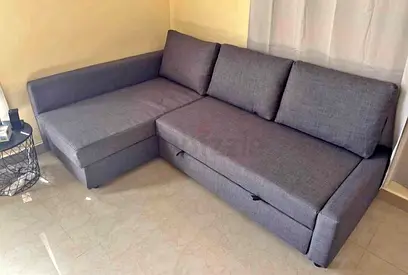 Gray L-shaped Convertible Sofa with Storage  Good Condition