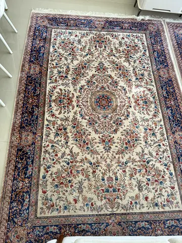 Machine-made Persian silk carpet