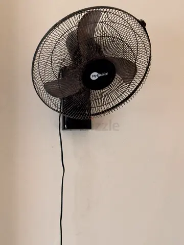 Wall-mounted electric fan (used) - working condition