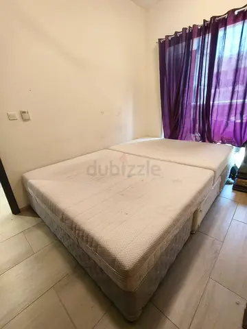 Pair of Single Mattresses on Divan Bases - Good Condition urgent sale leaving country