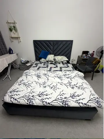 Queen bed frame with upholstered headboard and mattress (used)