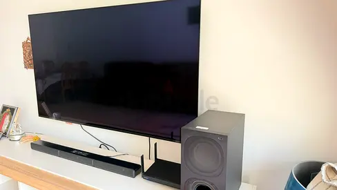 Sony 65 Smart TV Wall-Mounted with Soundbar and Subwoofer
