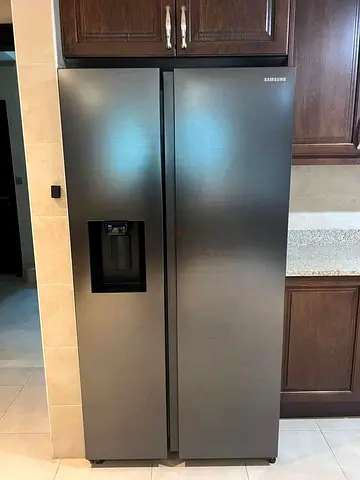 Samsung Side-by-Side Refrigerator with Water Dispenser - Good Condition