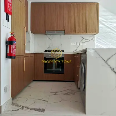 Unfurnished Studio | Prime Location | Pool & Gym | Best Rental Deal