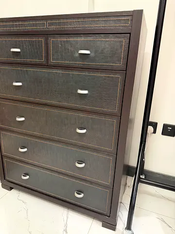 Dark brown 5-drawer chest with faux leather textured fronts