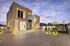 Own the largest villa in Al Yasmin area, 8000 sq ft, with 6 bedrooms, a swimming pool, and a large g
