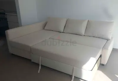Beige L-shaped Sofa Bed with Storage - Good Condition
