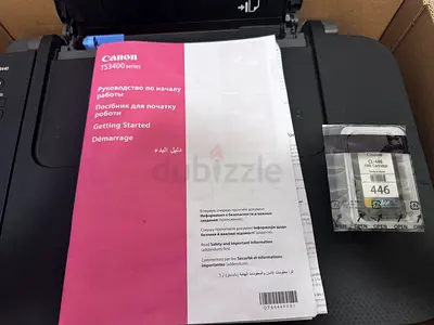 Canon PIXMA Wireless Printer TS3400 with 1 extra genuine Canon ink cartridge.