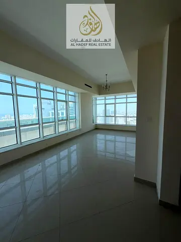 Luxury spacious apartment for sale in Sharjah 400 sqm 4 bedrooms with maid room majlis and parking