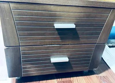 Dark wood two-drawer bedside/nightstand - compact and sturdy