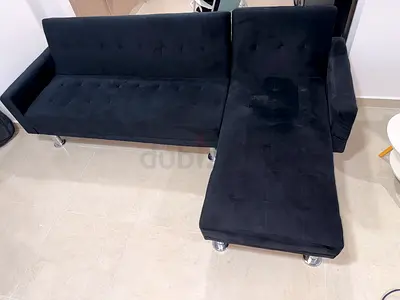 Dark blue L-shaped Sofa Bed with Chrome Legs - Good Condition