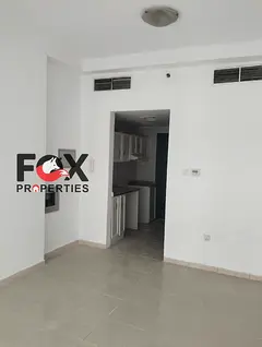 Semi-detached kitchen studio apartment for annual rent in Pearl Towers, Rashidiya 1. Rent is AED 17,