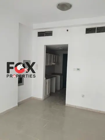 Semi-detached kitchen studio apartment for annual rent in Pearl Towers, Rashidiya 1. Rent is AED 17,000, payable in 4 installments.