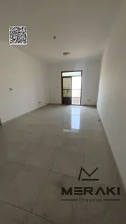 Immediate delivery, two bedrooms and a living room, with a down payment of 90,000 dirhams, open view