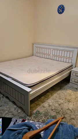 King size bed with mattress and side table
