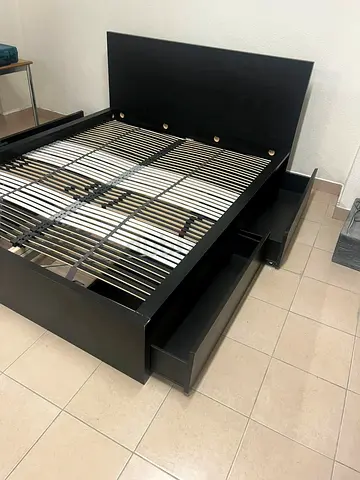 IKEA MALM bed, with built-in storage drawers under the bed