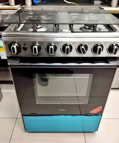 Midea 4-Burner Gas Cooker with Oven - Freestanding, Good Condition