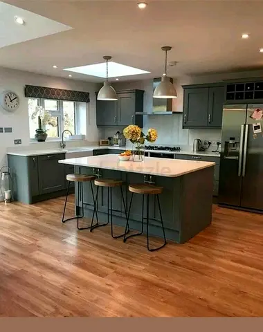 Modern Grey Kitchen with Central Island and Bar Stools