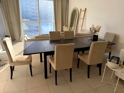 IKEA Dark Wood Extendable Dining Table with 6 Beige Upholstered Chairs