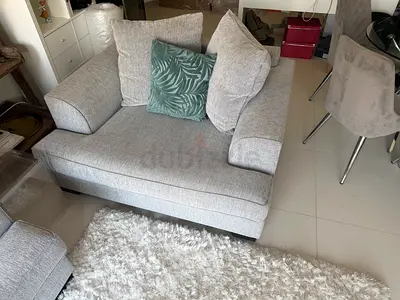 Light grey 2-seater loveseat / small sofa in excellent condition. Bought from The One Furniture stor