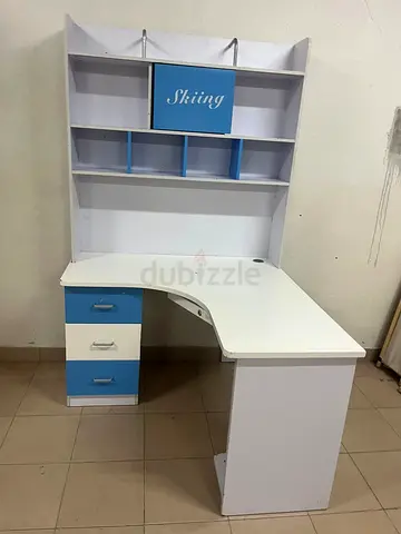 White and blue childrens study desk with overhead storage and drawers