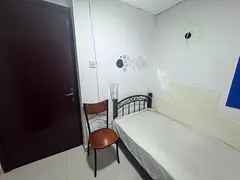 Furnished Small Room with Attached Washroom Available for Single Occupancy