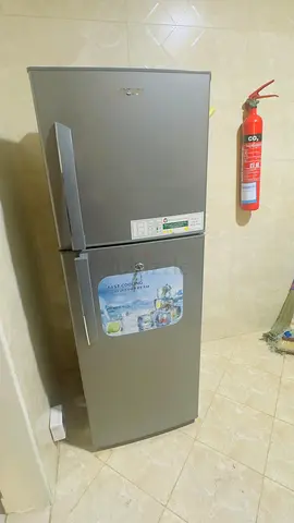 Silver Top-Freezer Refrigerator - Good Working Condition