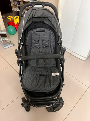 Compact grey baby stroller/pram in good condition