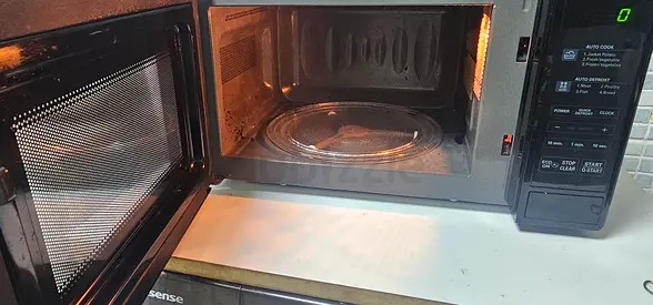 Used Hisense Microwave Oven - Working Condition, Needs Cleaning