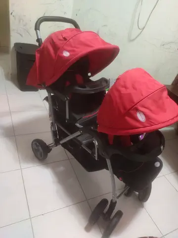 Red double tandem stroller - good condition