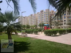 Spacious two-bedroom apartment with a living room for sale in Al Ameera Village, Ajman. Designed wit