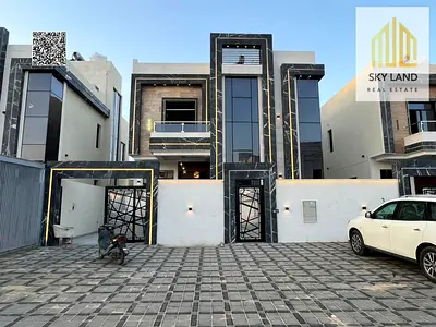 Villa for sale in Al Helio 1, Ajman, 5 master bedrooms, luxury finishing, near Mohammed Bin Zayed Road, area 3600 sq ft