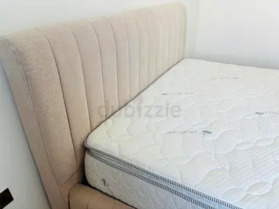 Beige Upholstered Double Bed Frame with Mattress. Queen Size