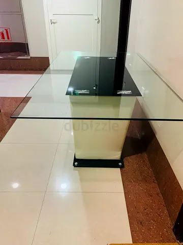 Glass Top Dining Table with Modern Pedestal Base