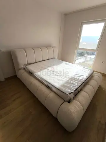 Beige Upholstered King-Size Bed Frame with Mattress (Like New)