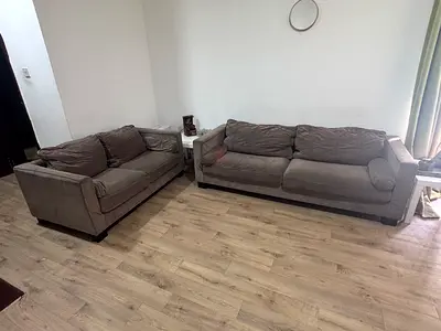 2-piece grey fabric sofa set — 3-seater and 2-seater, good condition