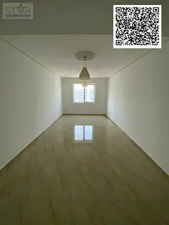 Two bedrooms and a living room, 2 bathrooms with a balcony, open view, annual rent in Ajman, Al Nuai