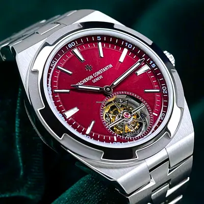 Vacheron Constantin style stainless steel watch with red dial and open heart