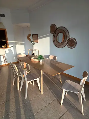 Extendable wooden dining table with 6 matching chairs - light oak finish