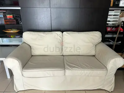 IKEA two-seater white slipcovered sofa - good condition