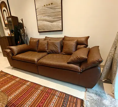 Brown leather 3-seater sofa in good condition