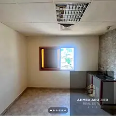 Studio for annual rent in Al Bustan, with a distinctive and quiet location, for 15,000 AED per year,