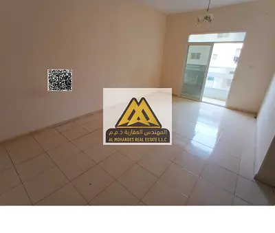 Two-bedroom apartment with hall in Al Nuaimiya 2, King Faisal Street. 34,000 AED, 4 payments. Central AC, free maintenance, excellent space, prime loc