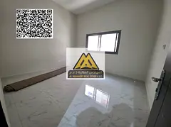 A spacious studio for annual rent in Al Jurf Industrial 3 – Ajman, featuring a separate kitchen fo