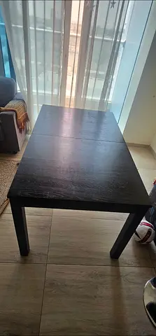 Solid dark wood coffee table and 6 chears — good condition