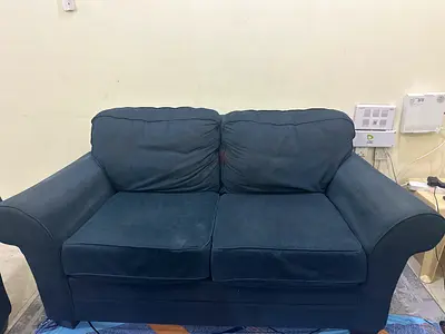 Six-seater navy fabric sofa in good used condition