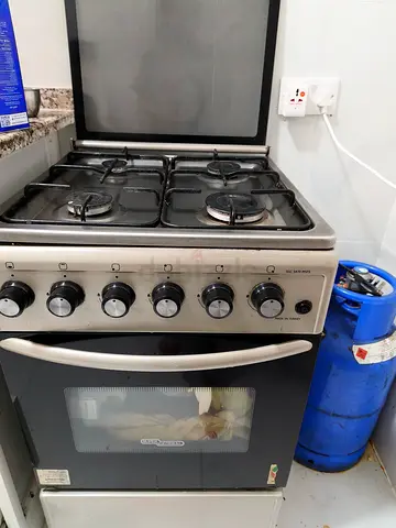Used 4-Burner Gas Cooker with Oven (Good Working Condition)