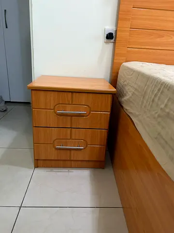 Bed frame available for sale, including one matching side table. Item is in good condition and ready