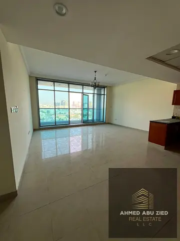 Luxury 1BR Hall for Annual Rent in Ajman Corniche Residences | Master Room, Open Kitchen, Free AC & Parking | Gym, Pool, Jacuzzi & Sauna