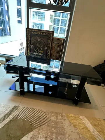 Black glass TV stand with shelves